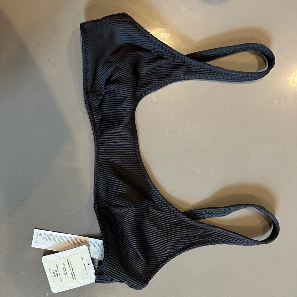 Size medium new with tags black scoop neck bathing suit top
